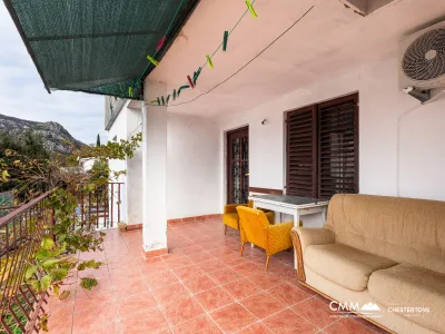 Family house in a quiet area with a terrace and greenery views.
