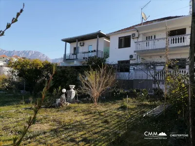 Two houses with a plot
