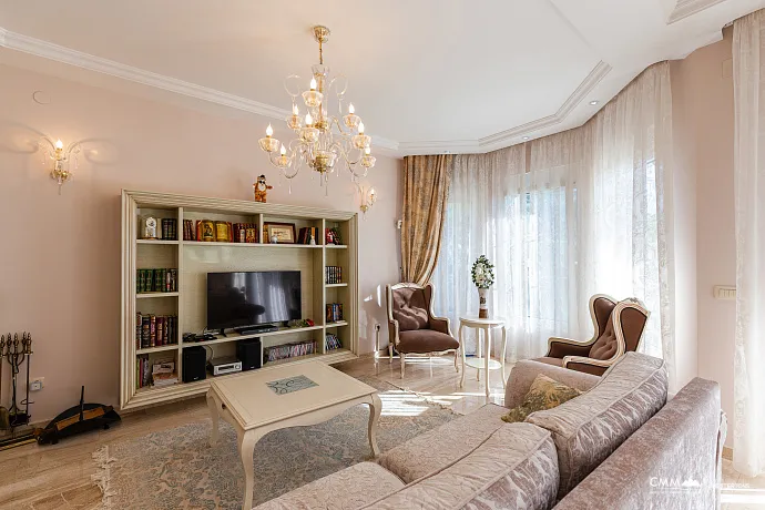 Elegance and serenity in a luxurious villa with natural views.