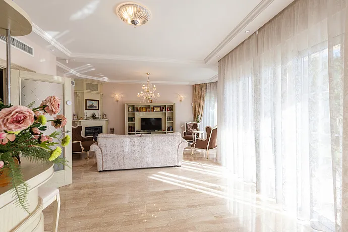 Elegance and serenity in a luxurious villa with natural views.