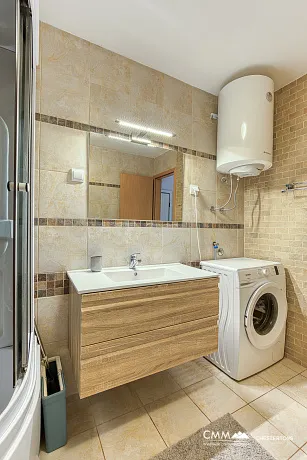 FOR SALE: SPACIOUS, FULLY FURNISHED APARTMENT IN BUDVA WITH GARAGE AND TESLA CHARGER