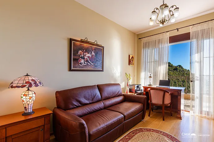 Elegance and serenity in a luxurious villa with natural views.