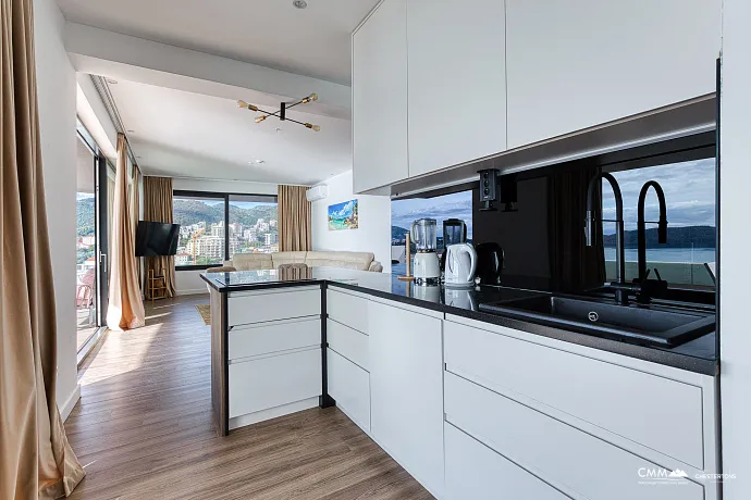 For sale: an exclusive, fully furnished luxury apartment with a spacious terrace.