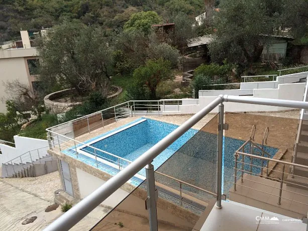 An apartment in a complex with swimming pool in Budva