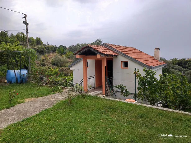 Two-story house with a large plot