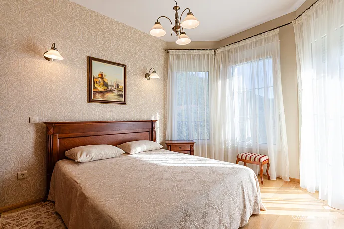 Elegance and serenity in a luxurious villa with natural views.