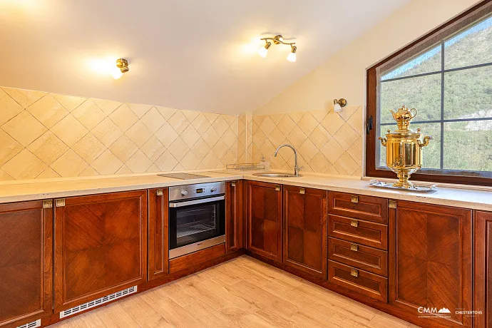 Elegance and serenity in a luxurious villa with natural views.