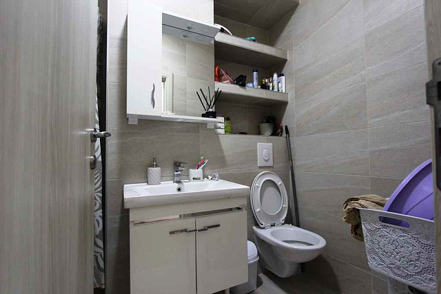 Apartment with a sea and city view in Budva — photo 8