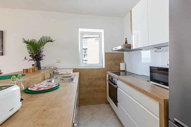 Spacious duplex apartment with sea view in Sveti Stefan — photo 8