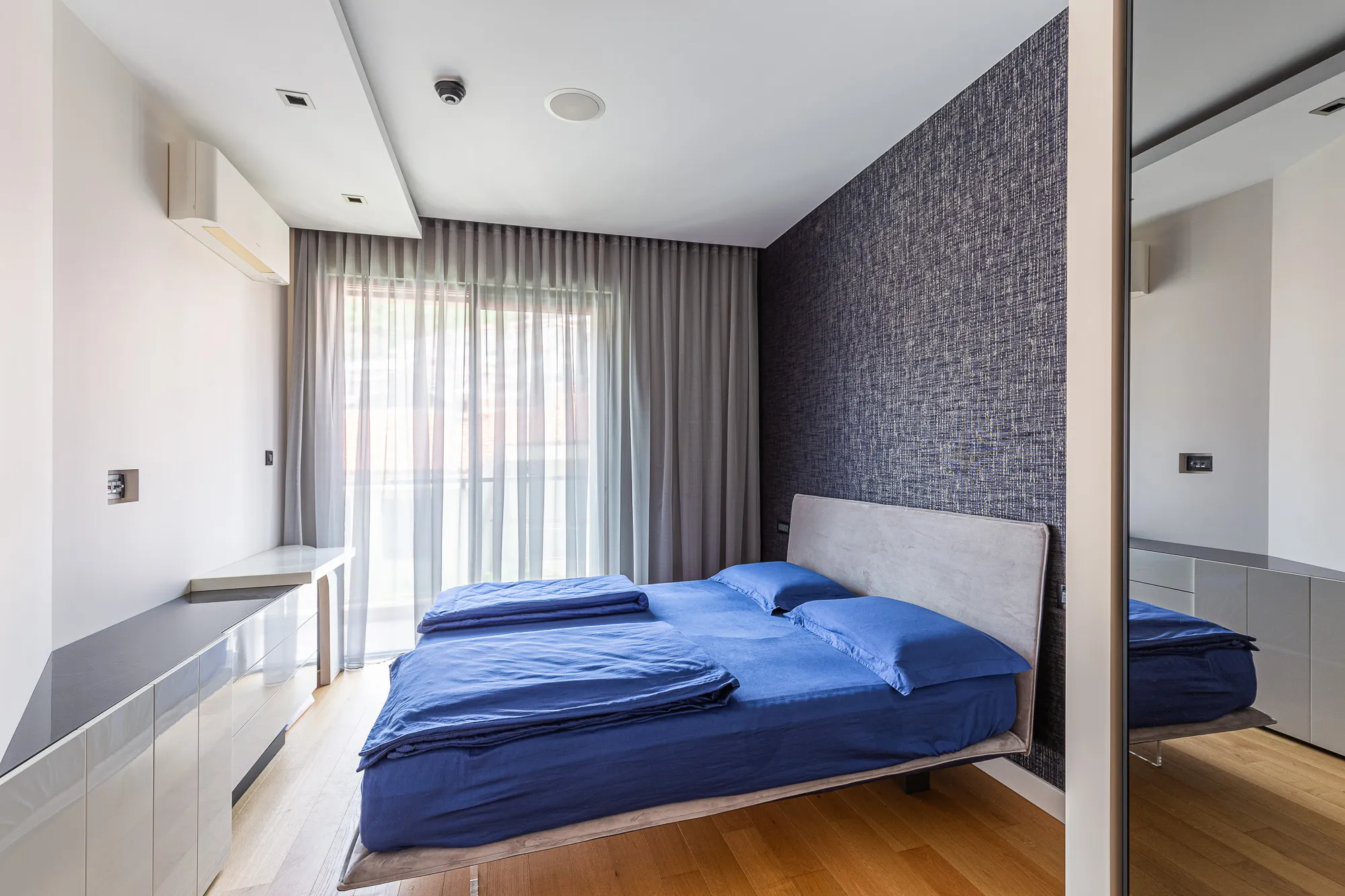 An elegant two-bedroom apartment with an exclusive design in the heart of Budva.
