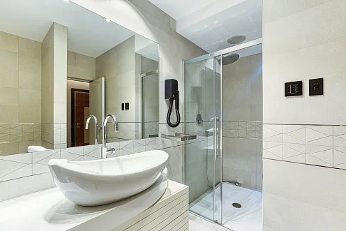 An elegant two-bedroom apartment with an exclusive design in the heart of Budva.