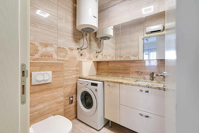 Modern One-Bedroom Apartment with Large Terrace and Garage in Bečići — photo 9