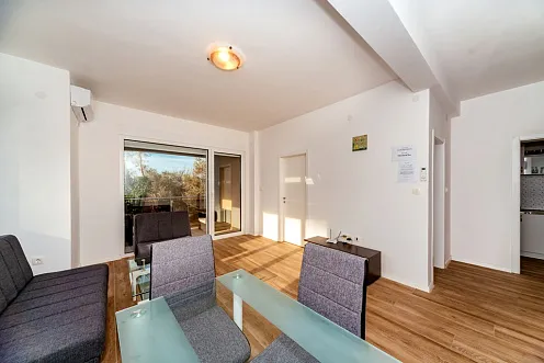 Apartment with sea views in residential building with an elevator in Rafailovici