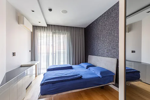 An elegant two-bedroom apartment with an exclusive design in the heart of Budva.