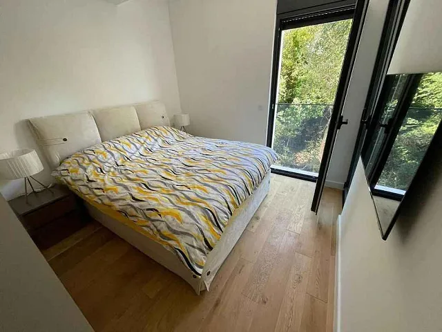 One bedroom apartment in a newly built complex in Bečići with a swimming pool on the roof — photo 6