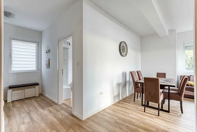 A bright and comfortable 65 m² apartment in Rafailovići — photo 14