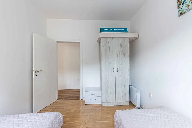 A bright and comfortable 65 m² apartment in Rafailovići — photo 16